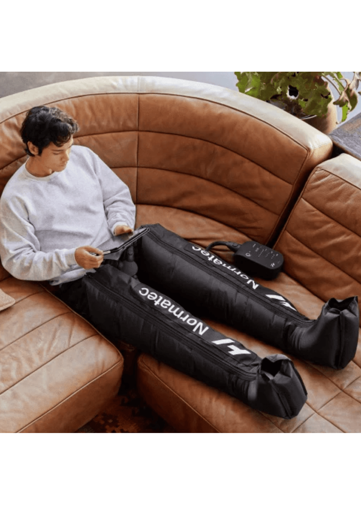 Botas pneumáticas Normatec em uso